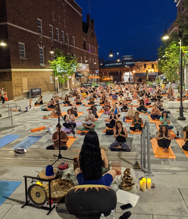 Outdoor Sunset Yoga at Wellmont Arts Plaza with Yoga Mechanics