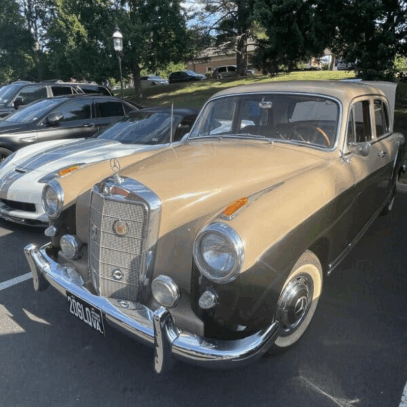 a vintage car at cars and coffee in great falls