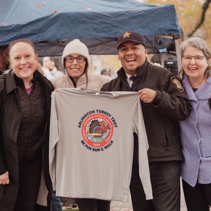 local law enforcement with volunteers at the turkey trot