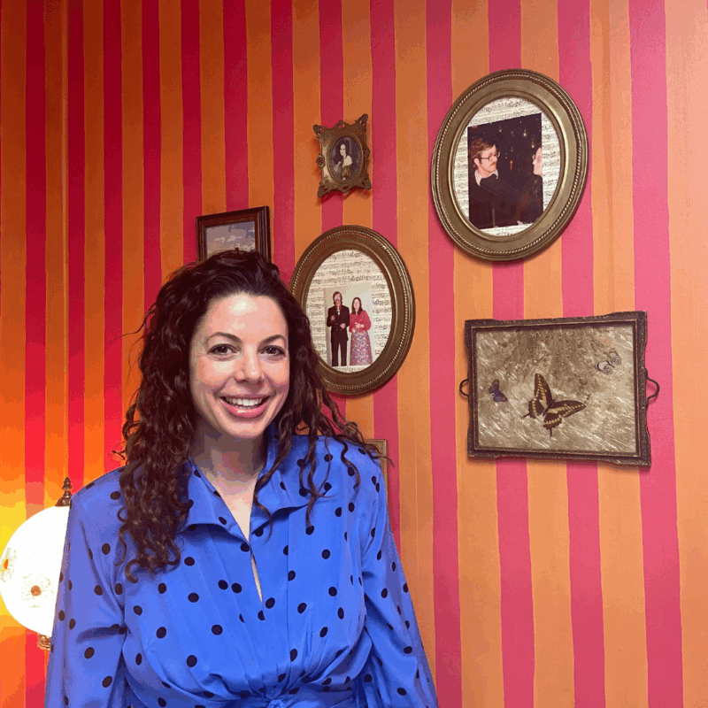 Jessica of Coco Cameo by her gallery wall